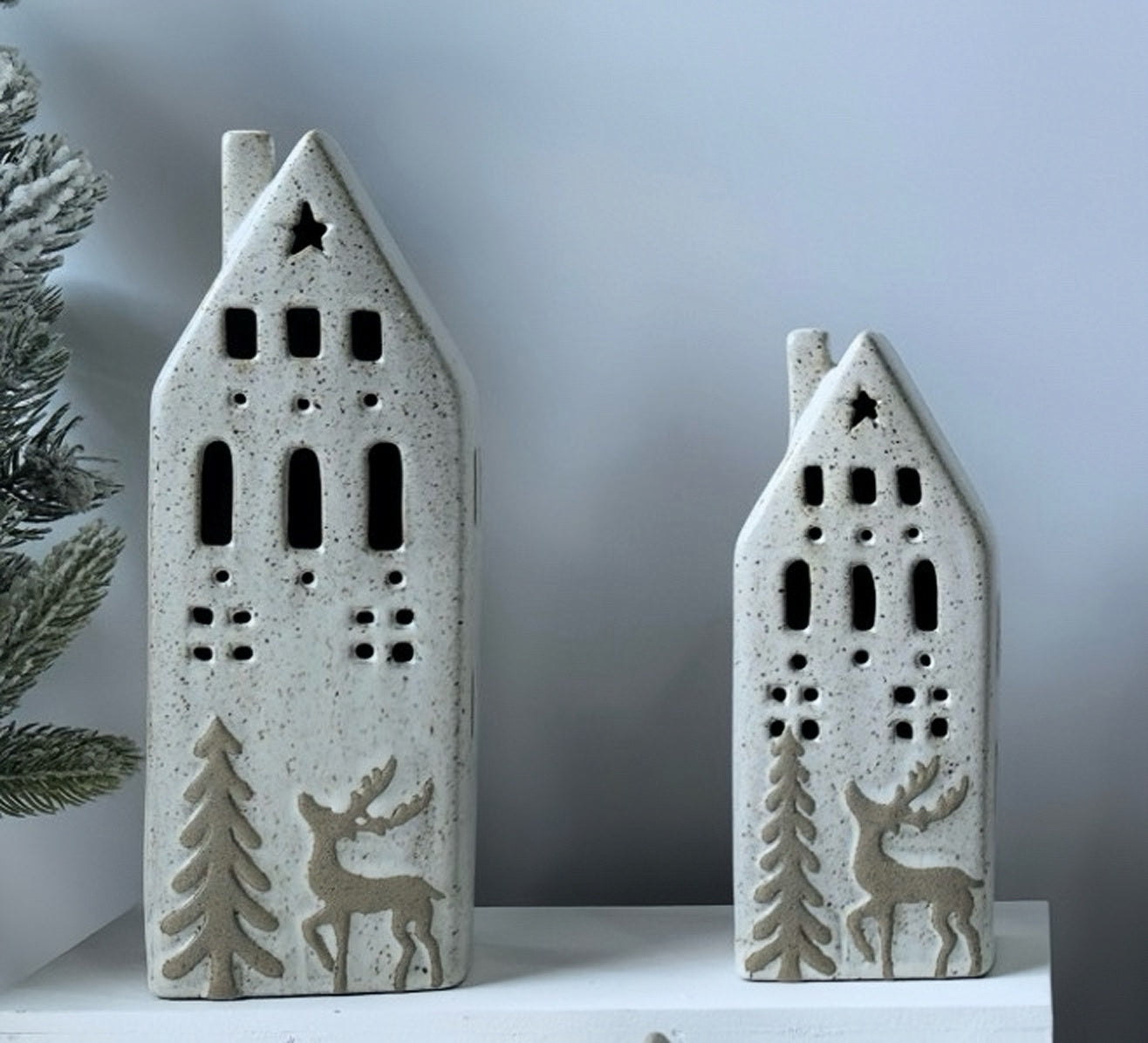 Scandinavian Winter Glow Ceramic House Duo with Rustic Reindeer Design