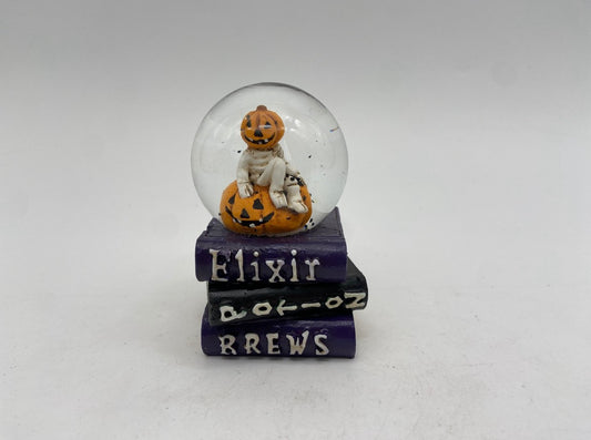 Pumpkin Spirit Snow Globe with Spellbinding Book Base