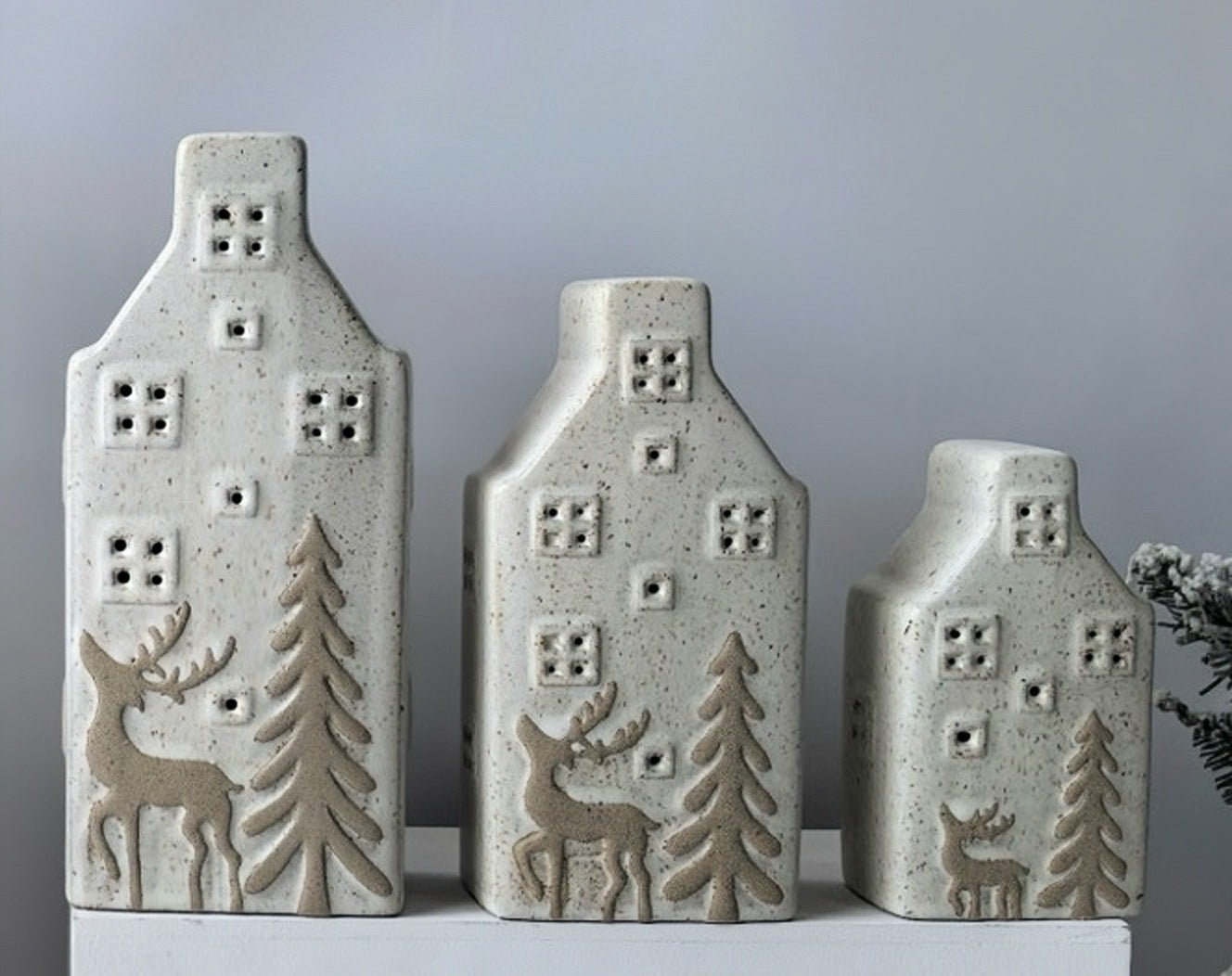 Rustic Ceramic Village Trio with Reindeer and Pine Forest Details