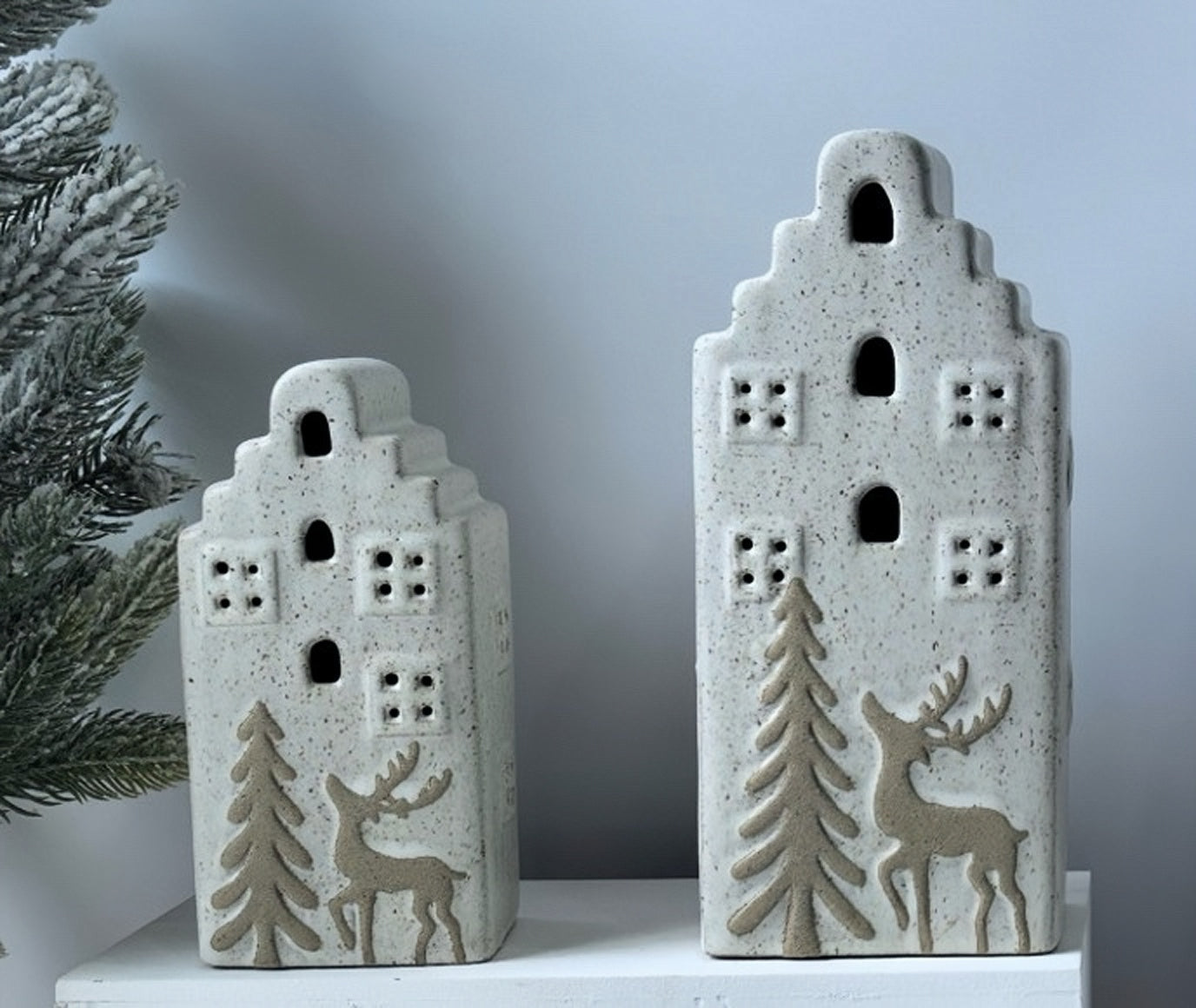 Nordic Tiered Ceramic House Duo with Elegant Reindeer Silhouettes