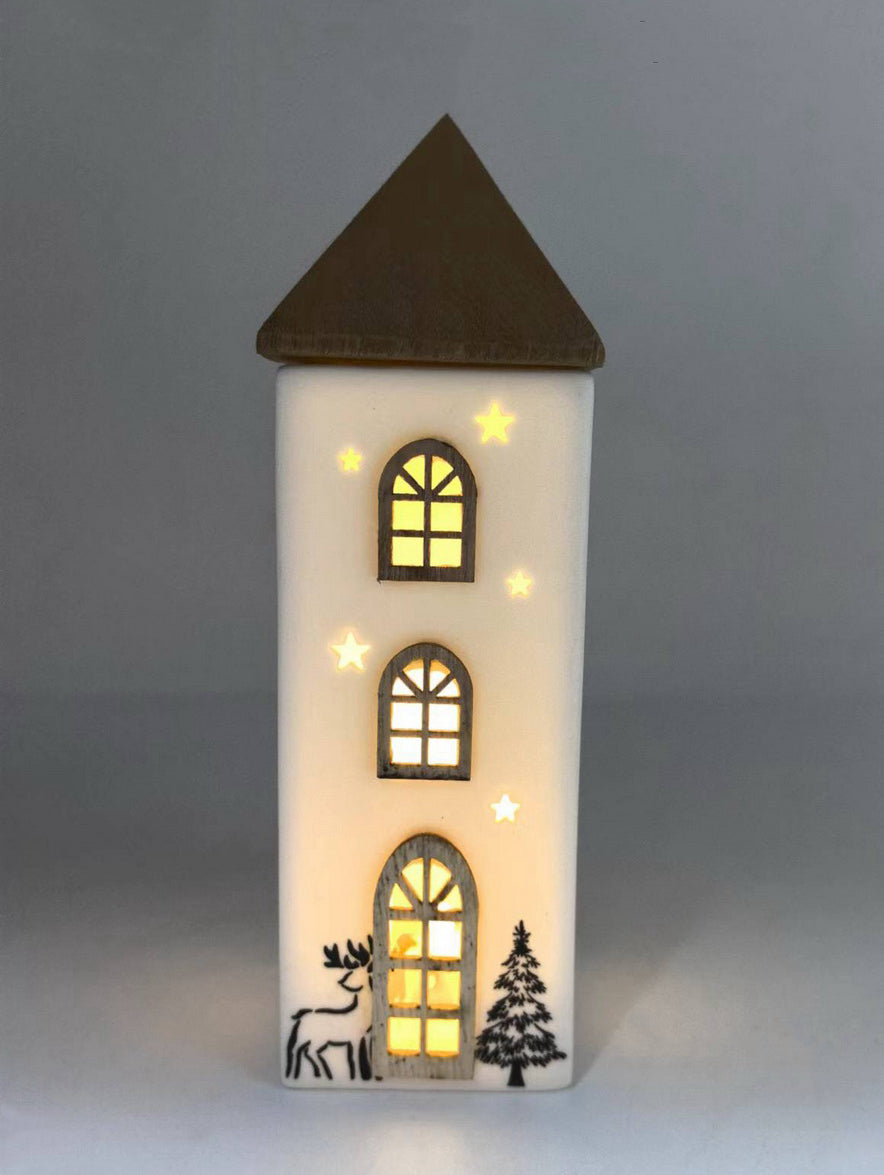 Illuminated Winter Tower with Wooden Roof and Starry Glow