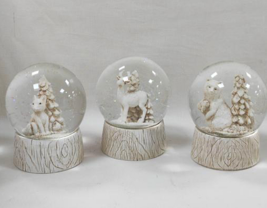 Woodland Charm Snow Globe Collection with Rustic Tree Trunk Base